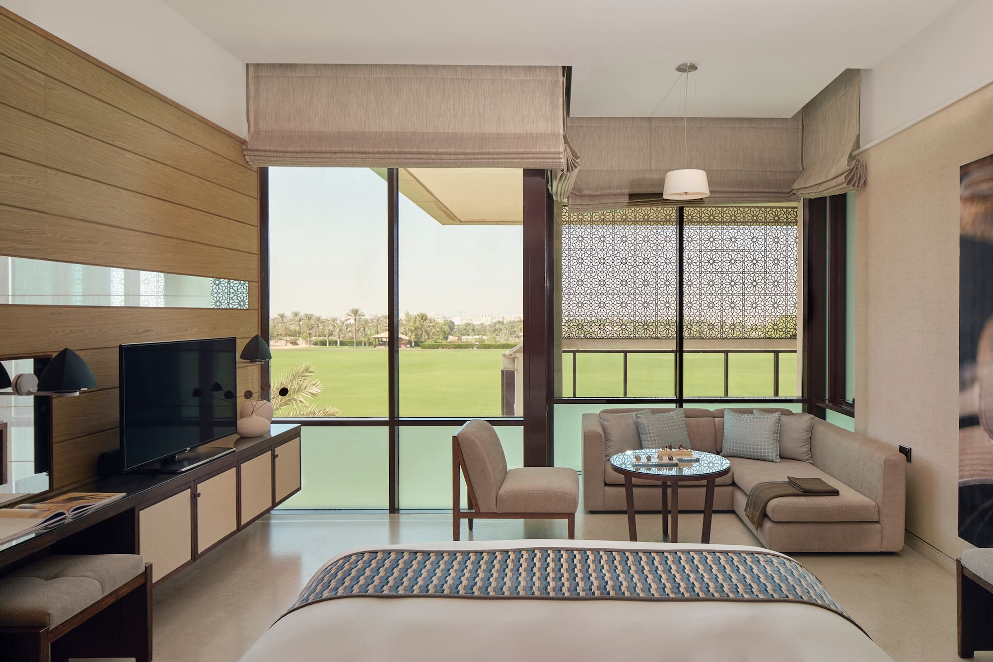 a room with a television and a bed