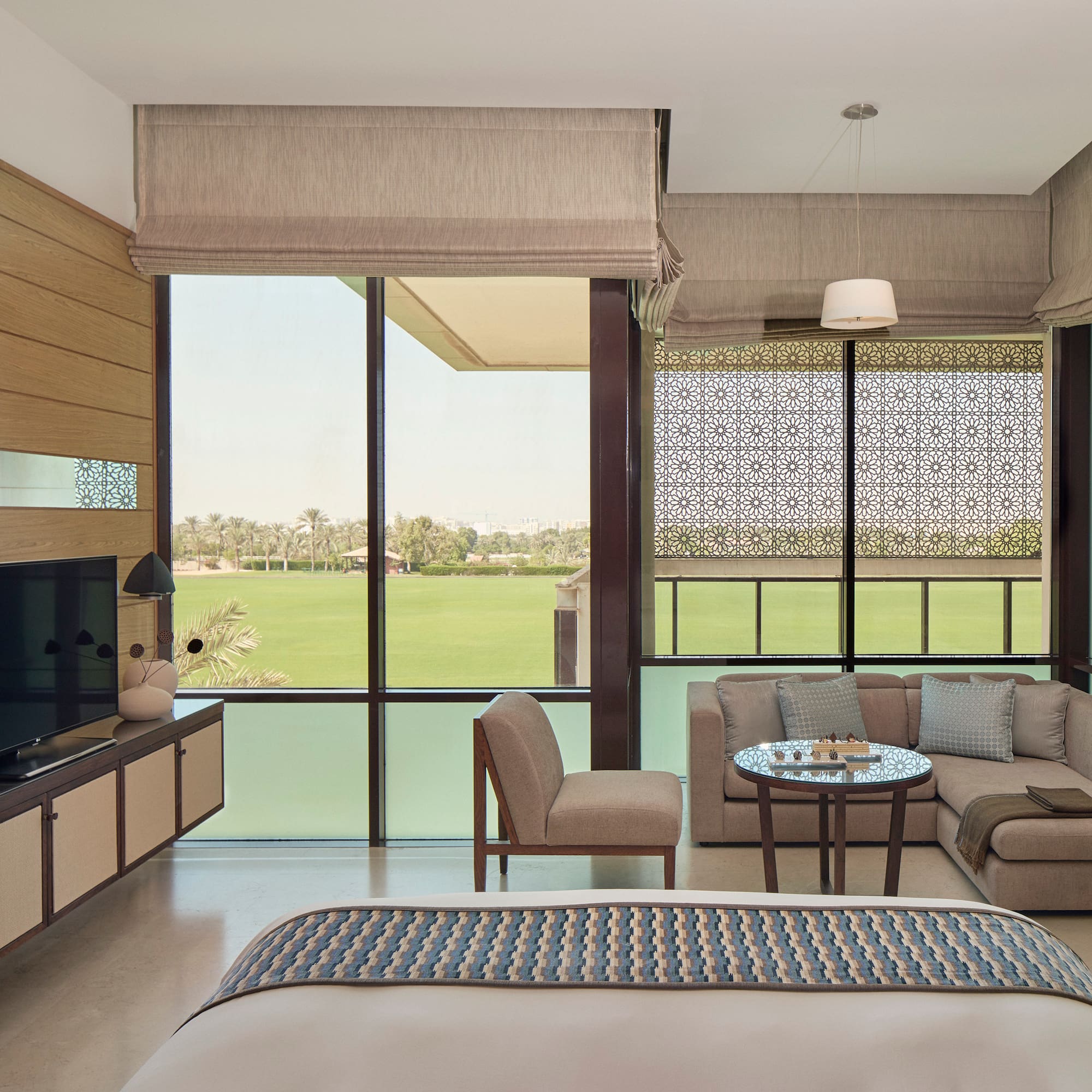 a room with a television and a bed