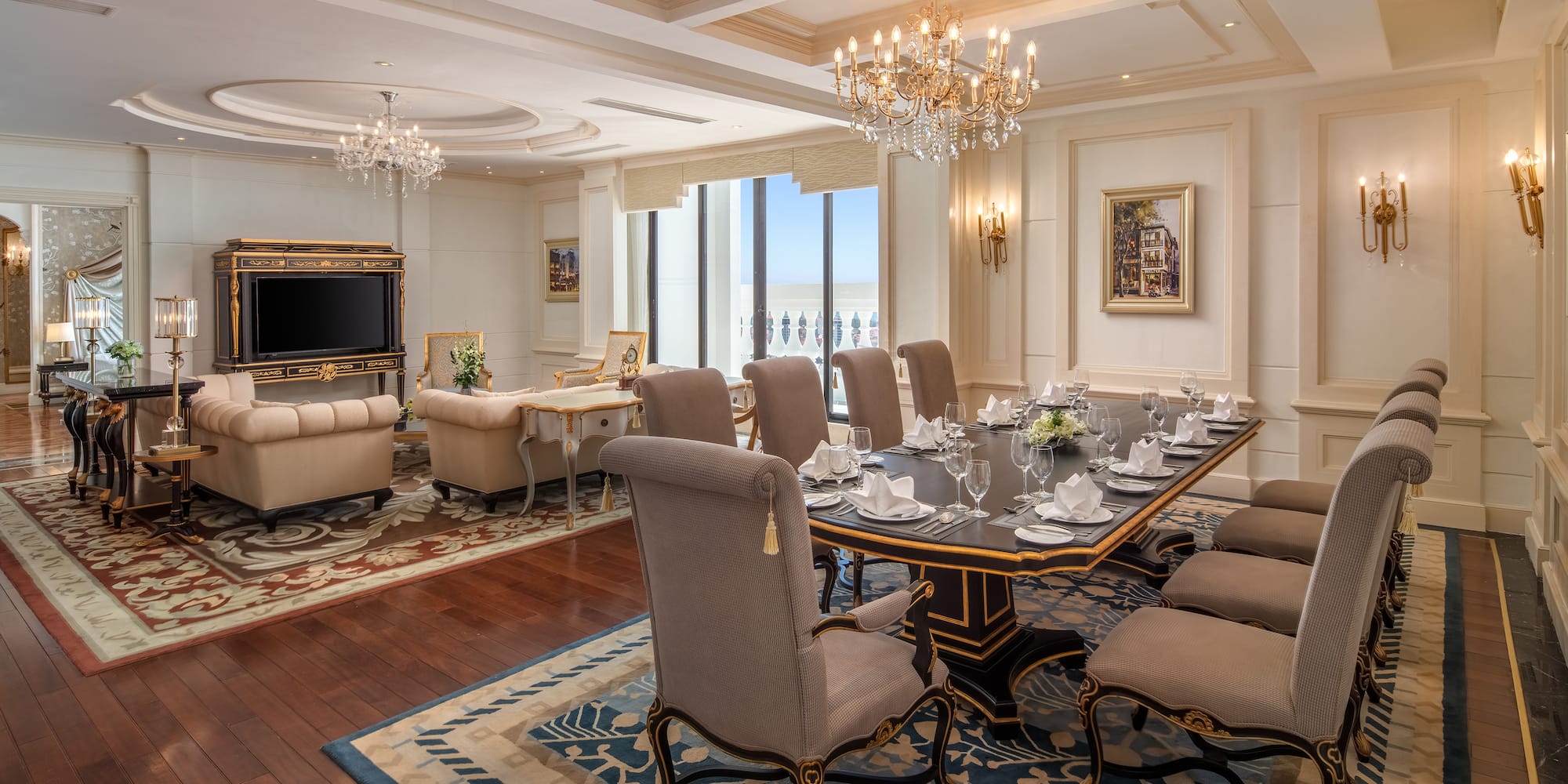 a room with a large table and chairs