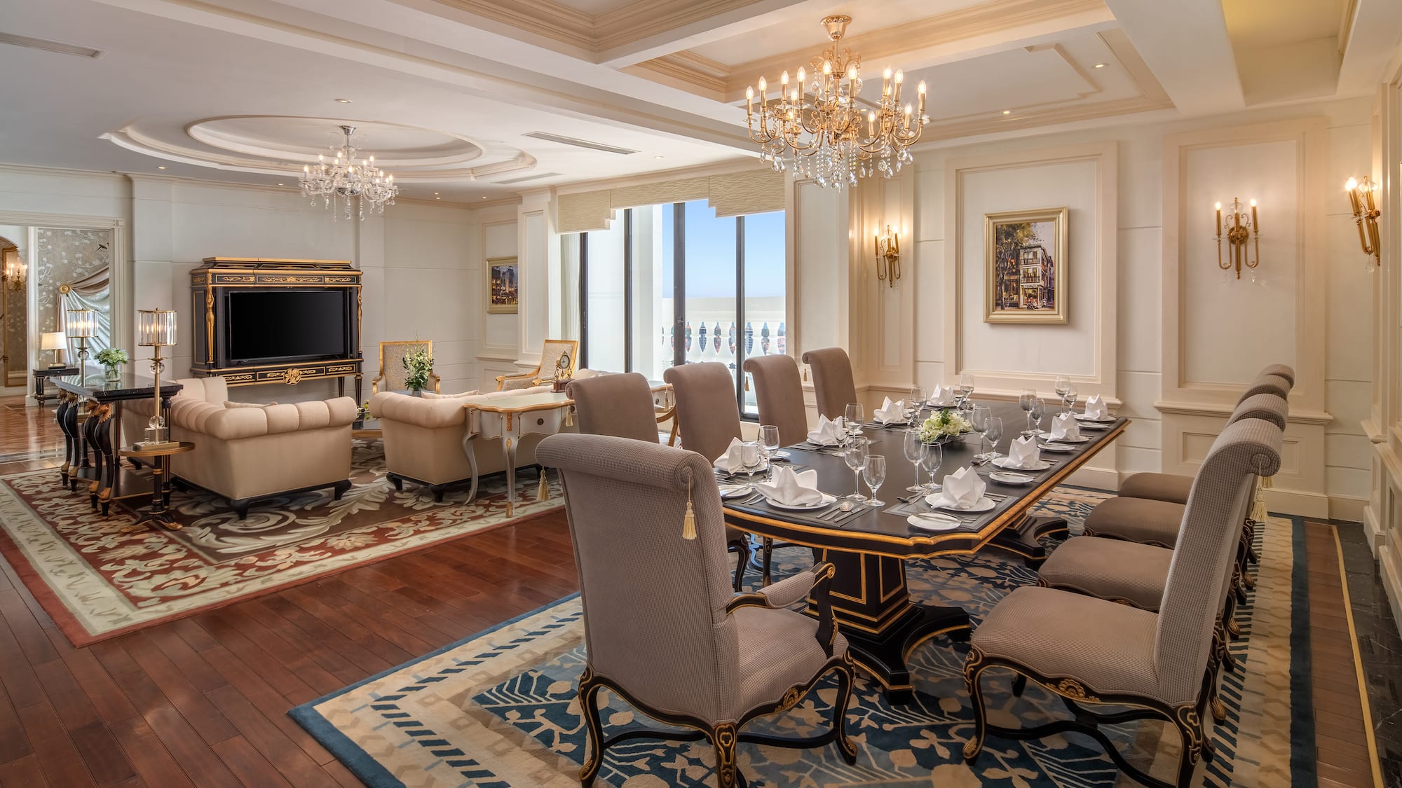 a room with a large table and chairs