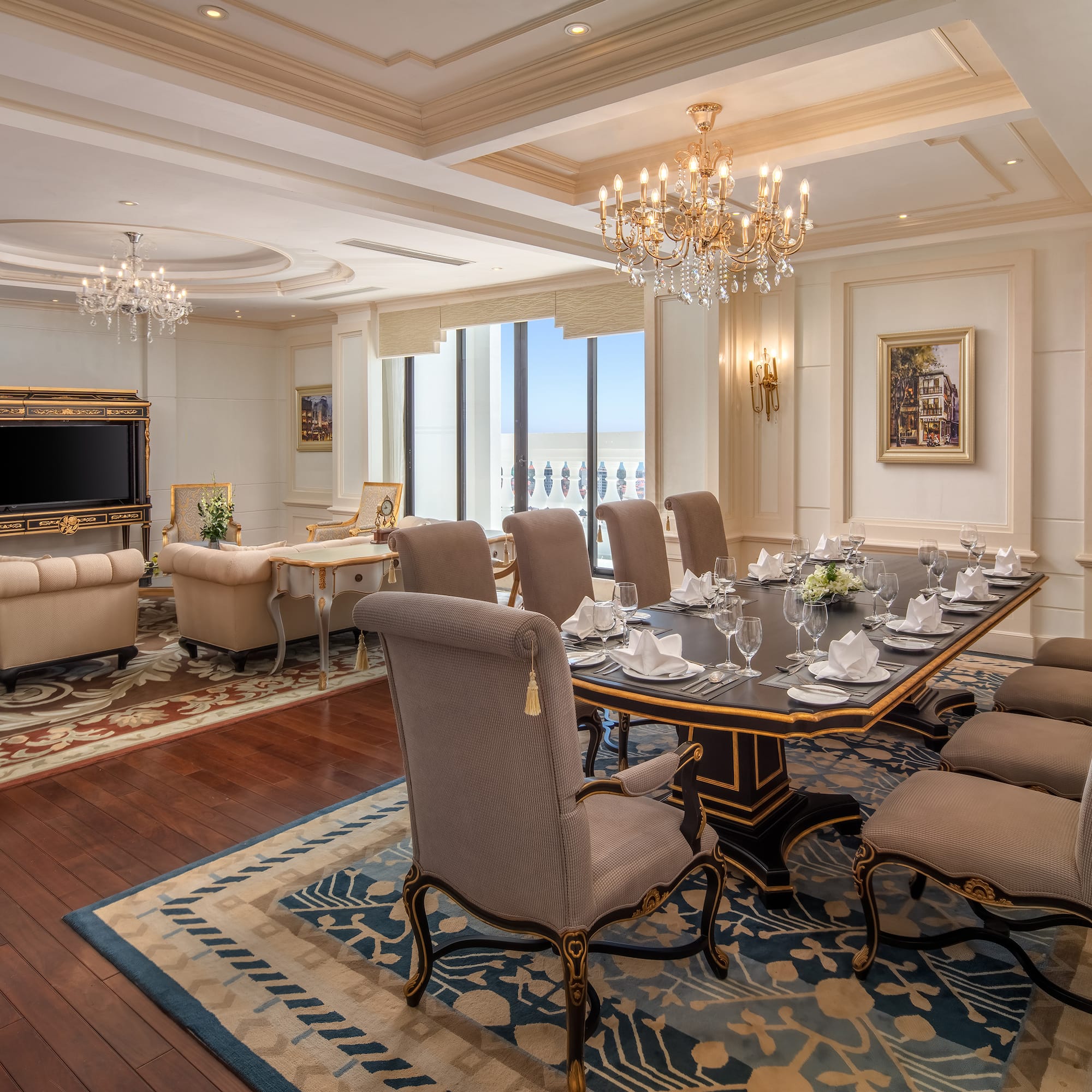 a room with a large table and chairs