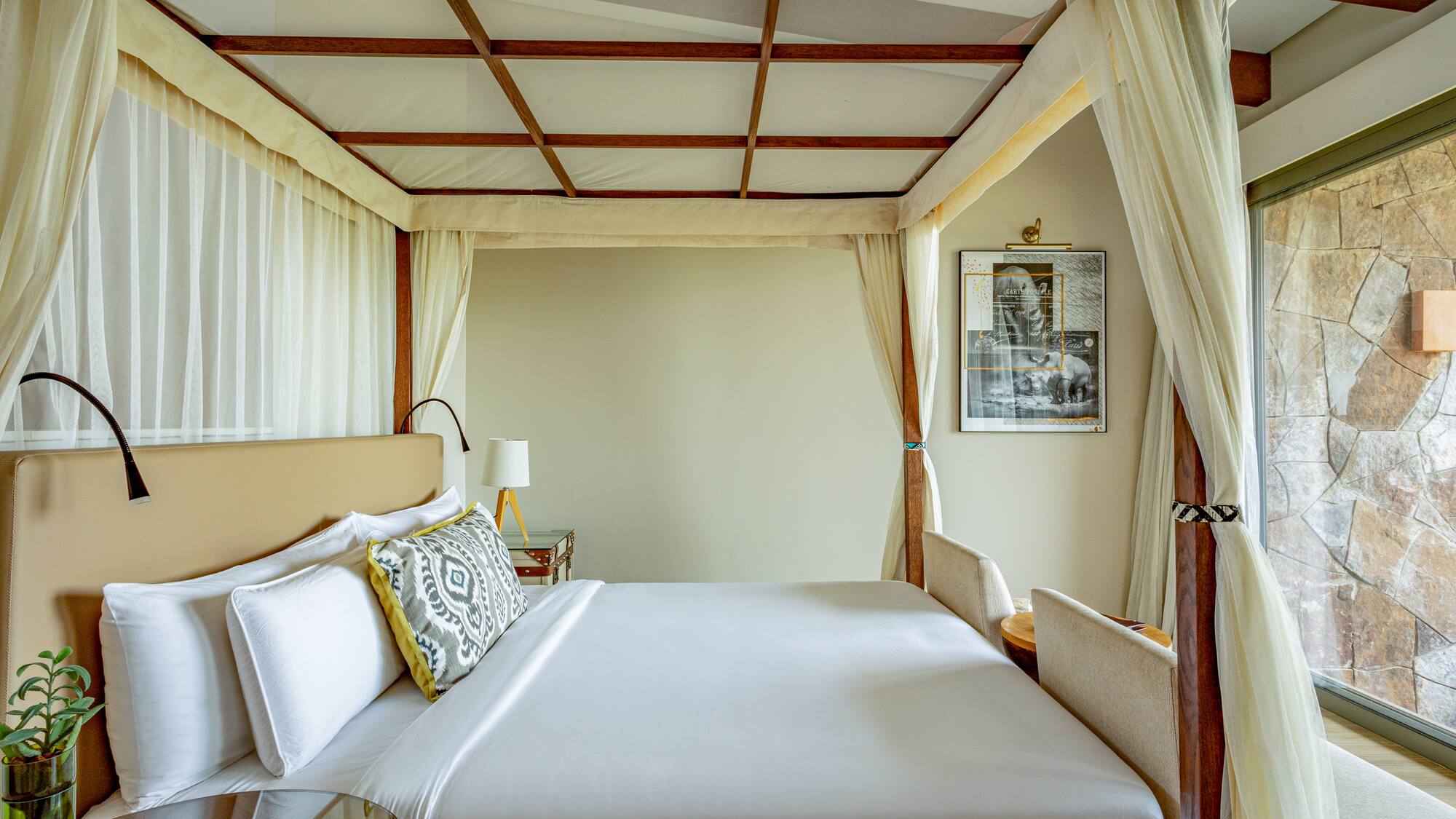 a bed with a canopy over it