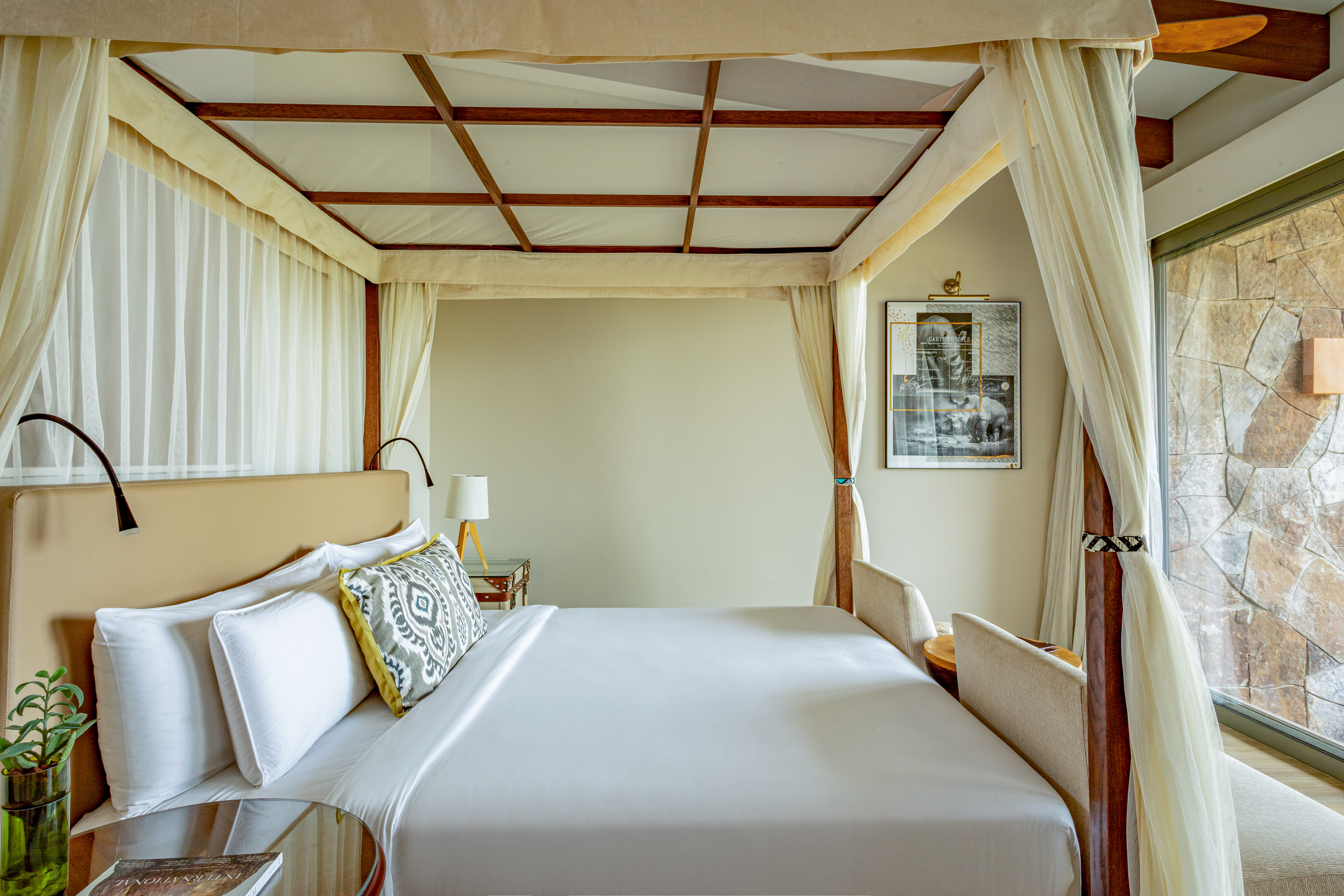 a bed with a canopy over it