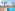 Resort swimming pool, palm trees, thatched parasols, lounge chairs, ocean view.