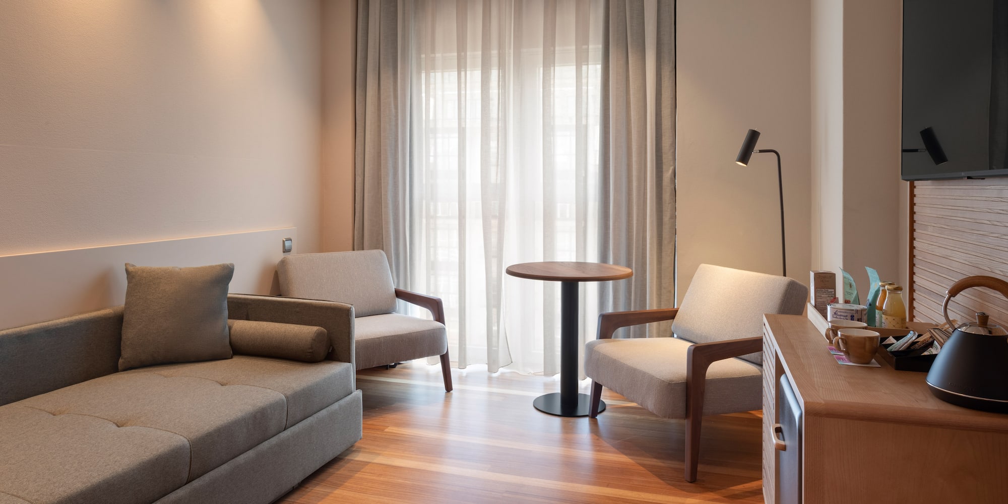 a living room with couches and a table