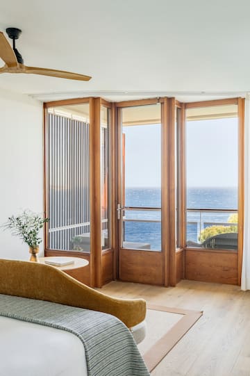 a room with a view of the ocean