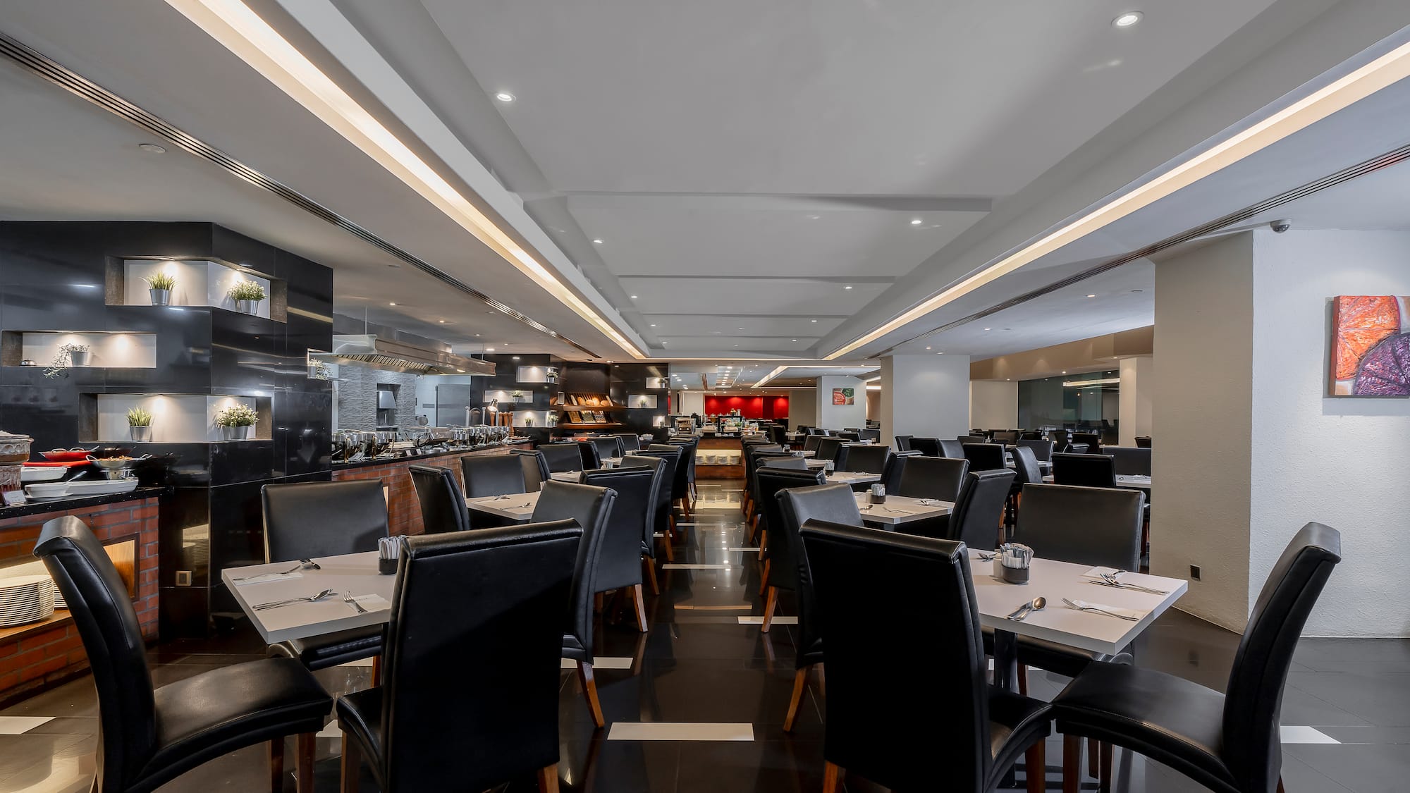 a restaurant with tables and chairs