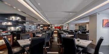 a restaurant with tables and chairs