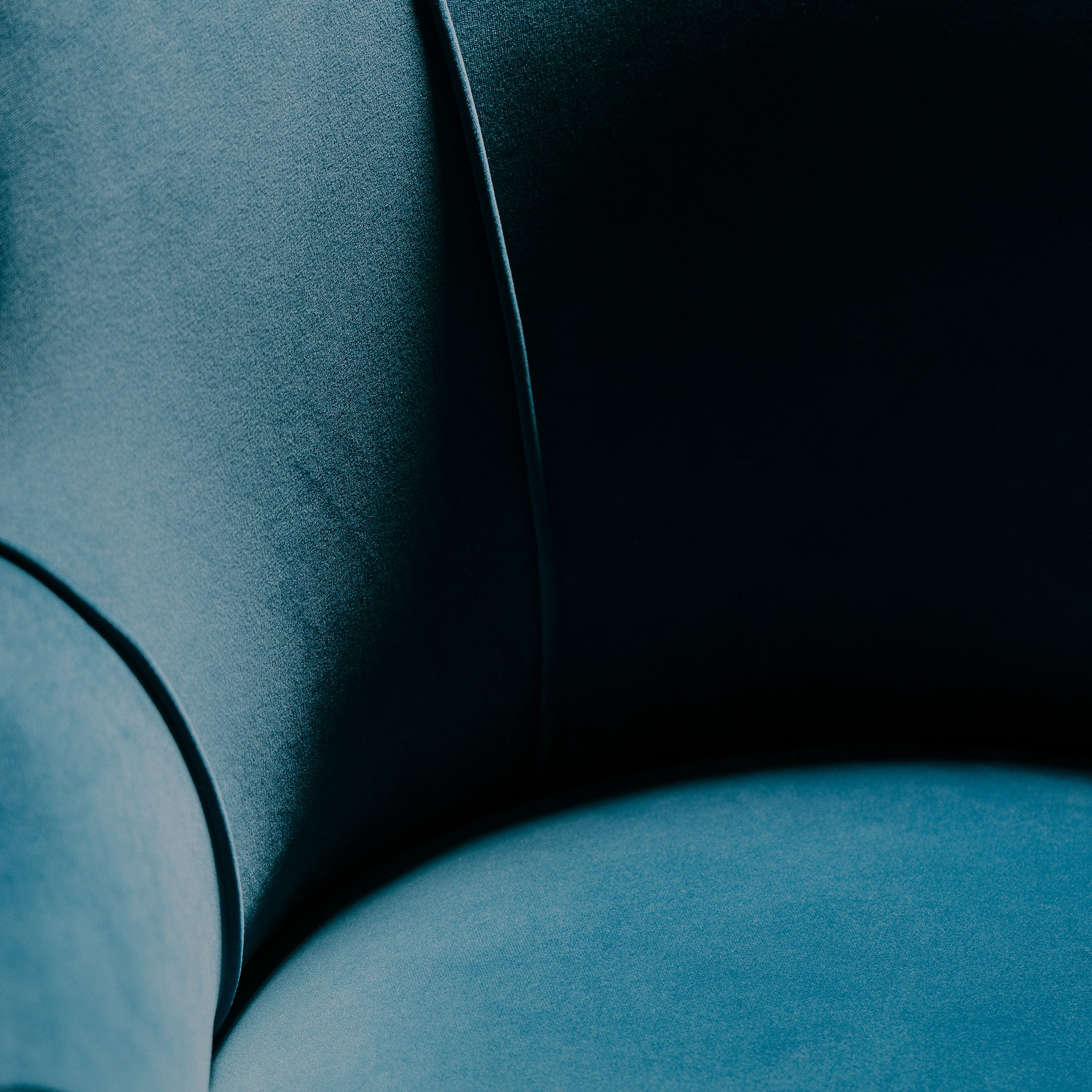 a close up of a blue chair