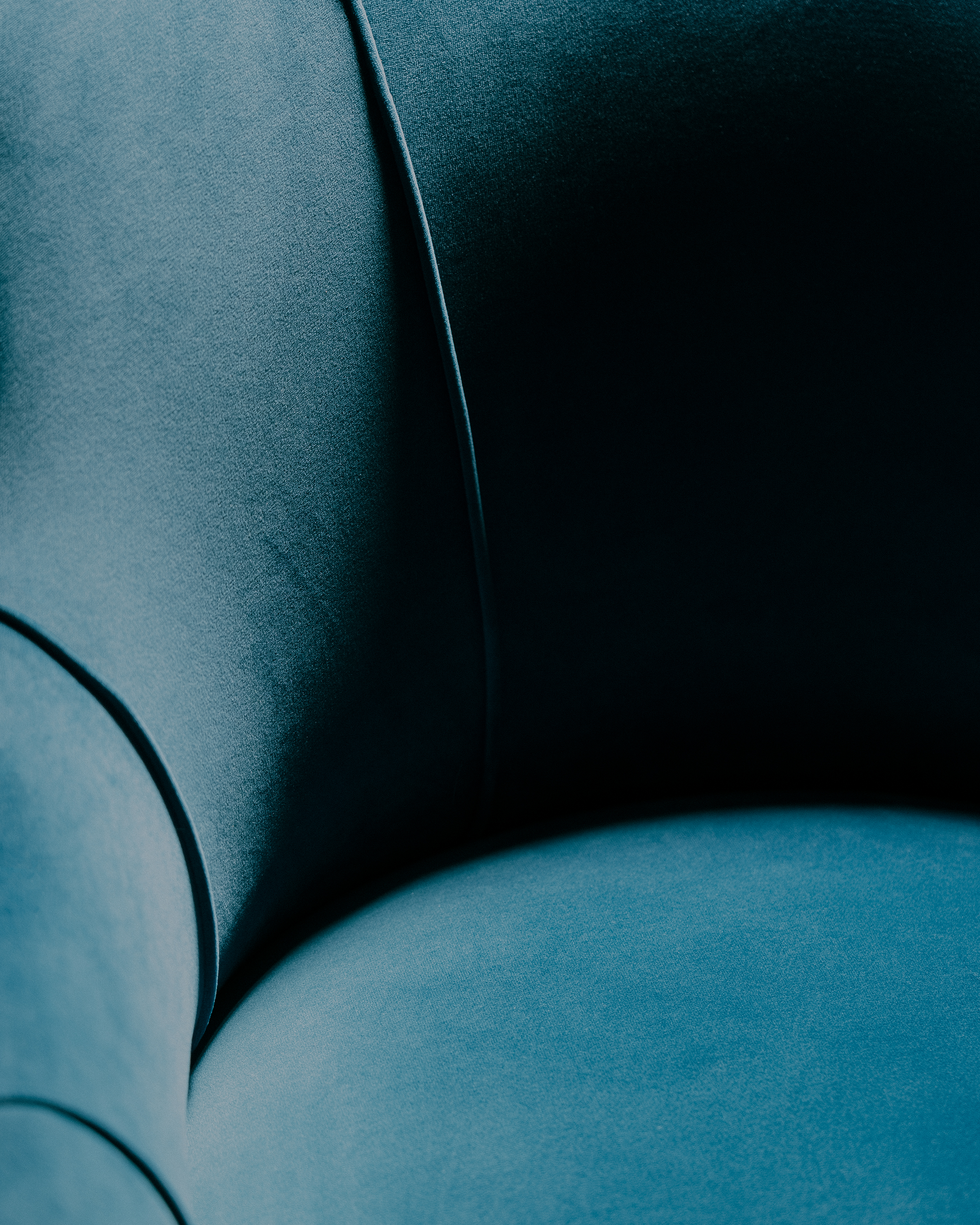 a close up of a blue chair