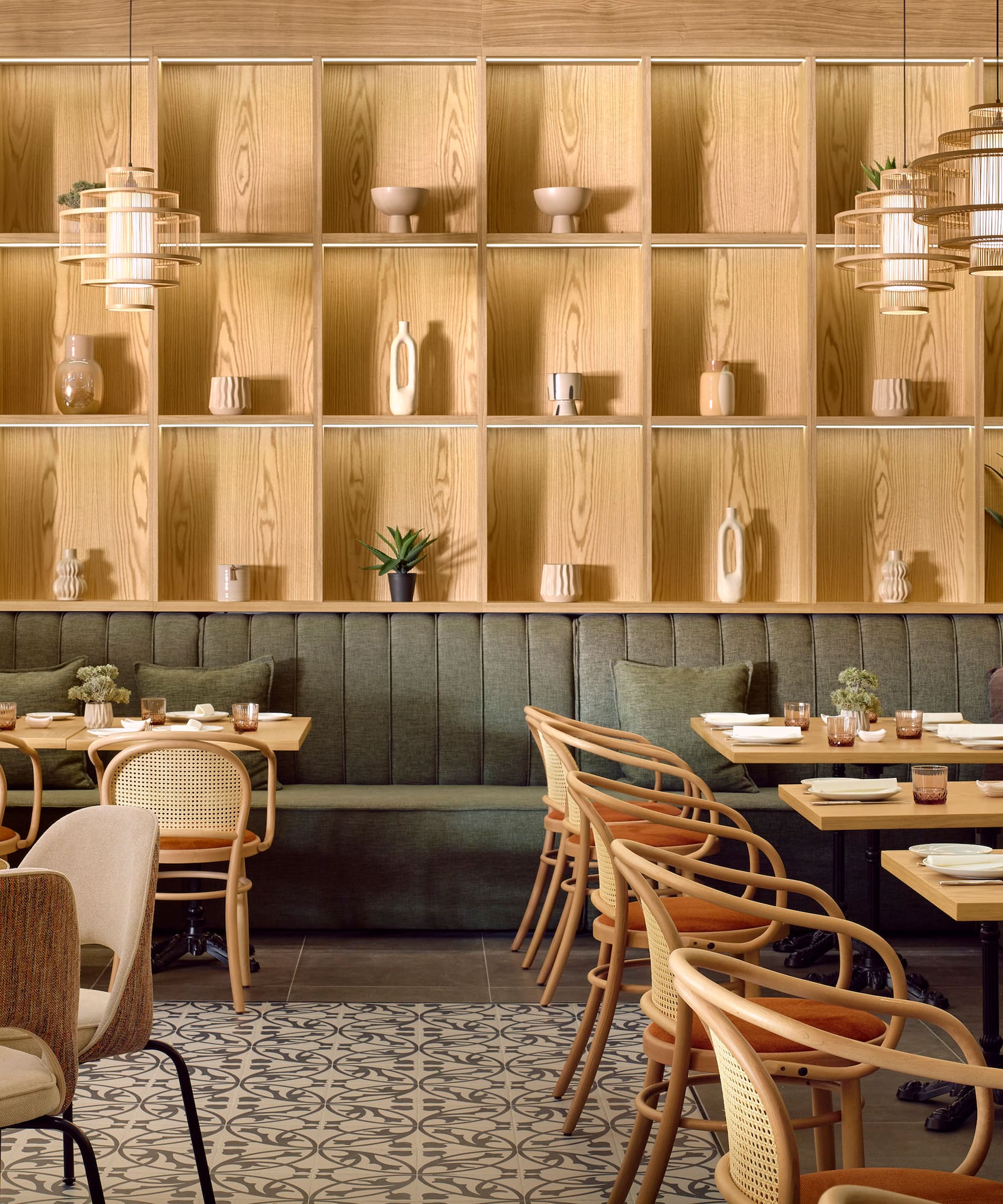 a restaurant with tables and chairs