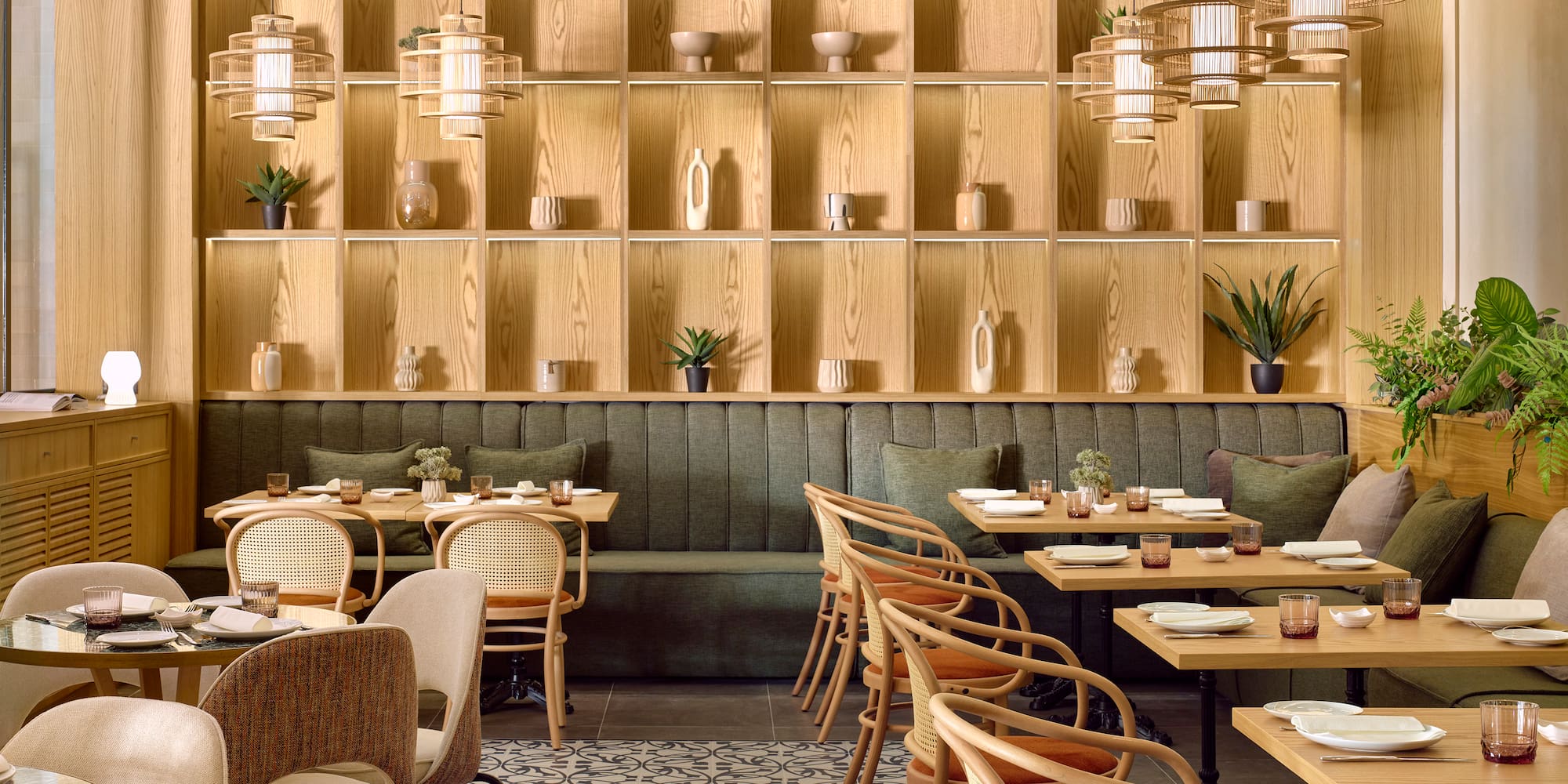 a restaurant with tables and chairs