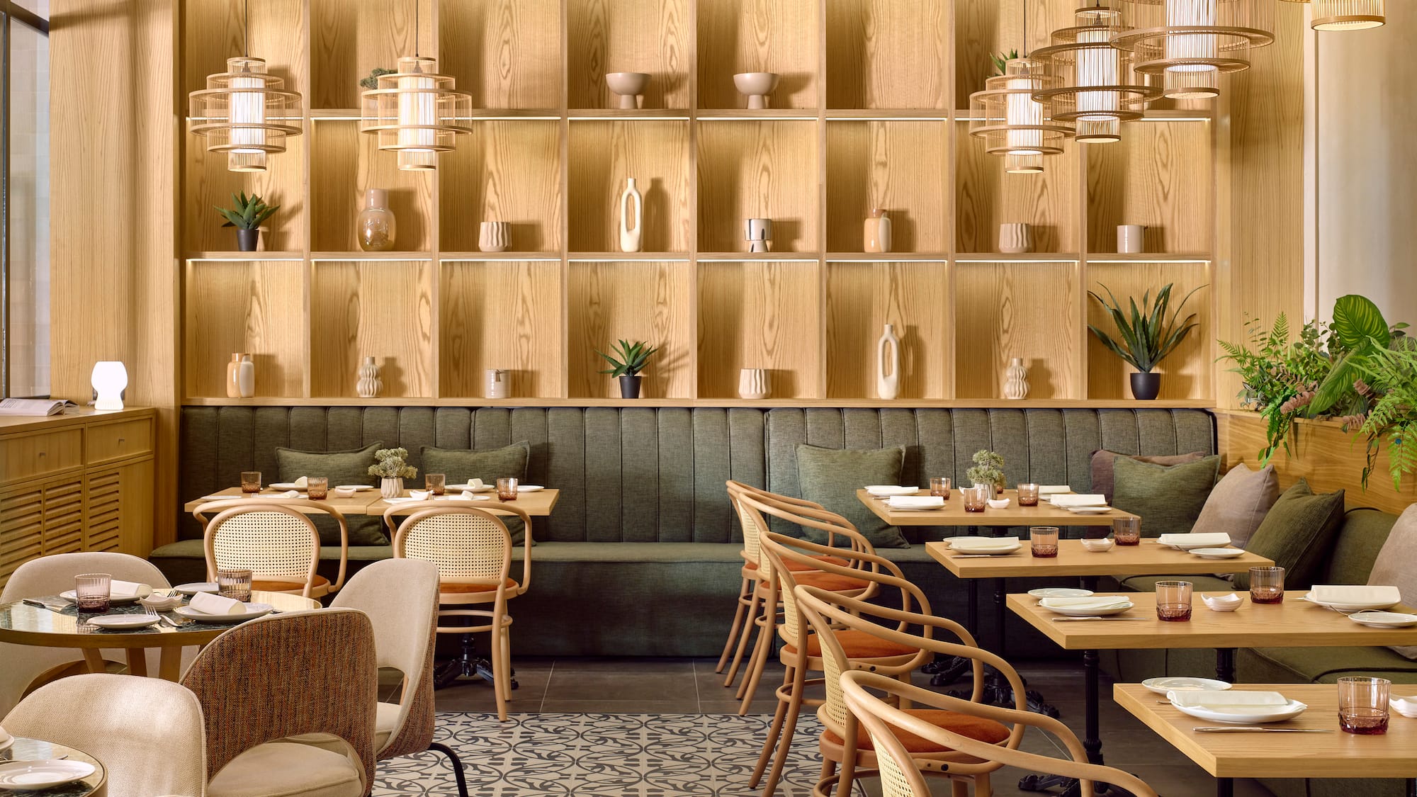 a restaurant with tables and chairs