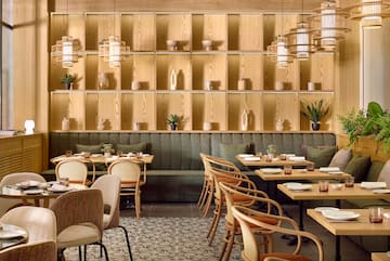 a restaurant with tables and chairs