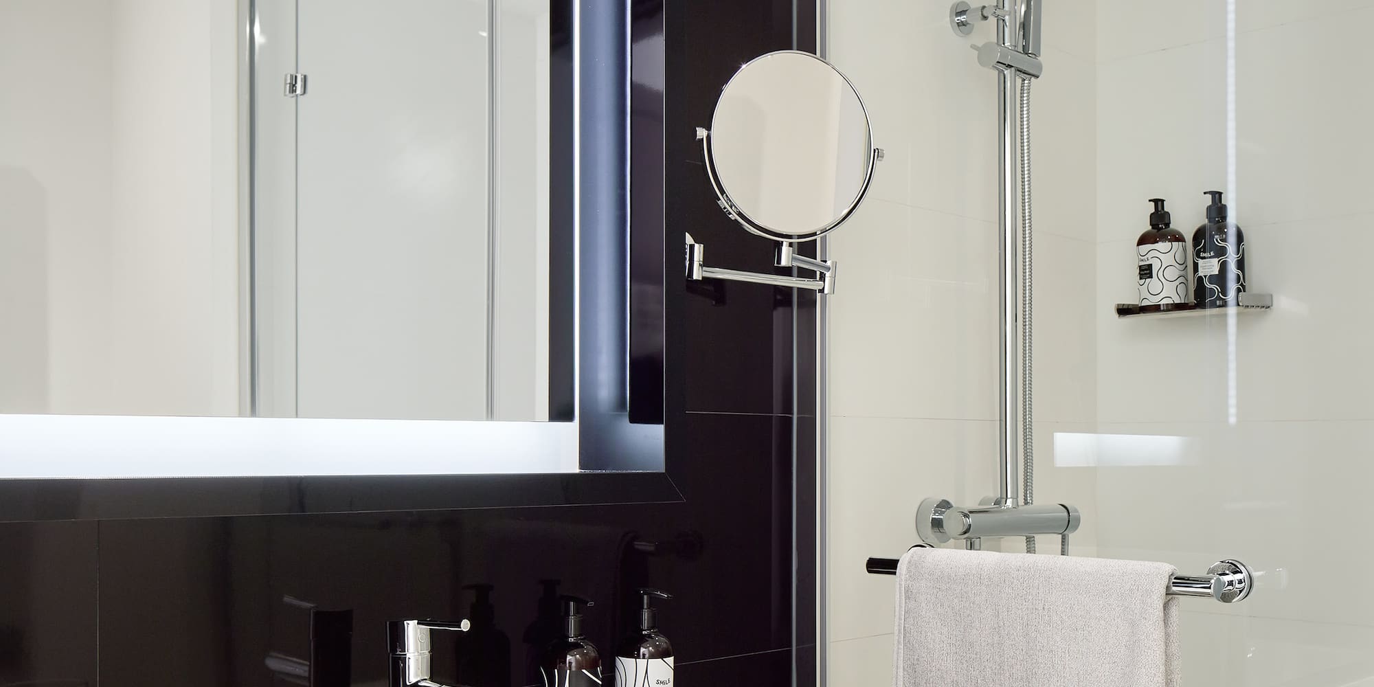 a bathroom with a mirror and sink