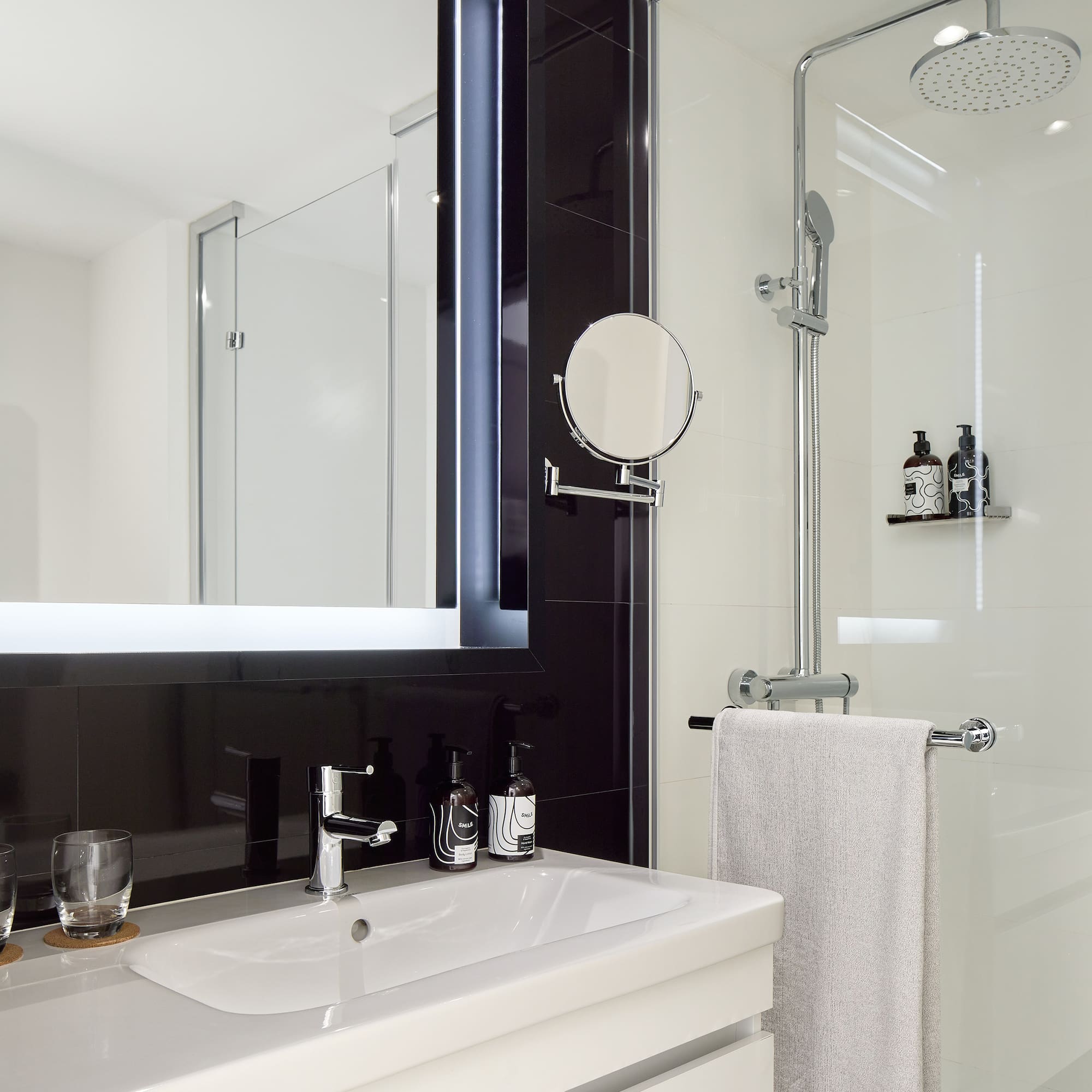 a bathroom with a mirror and sink