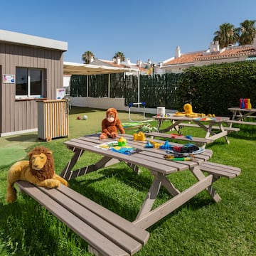 a picnic table with toys and toys on it