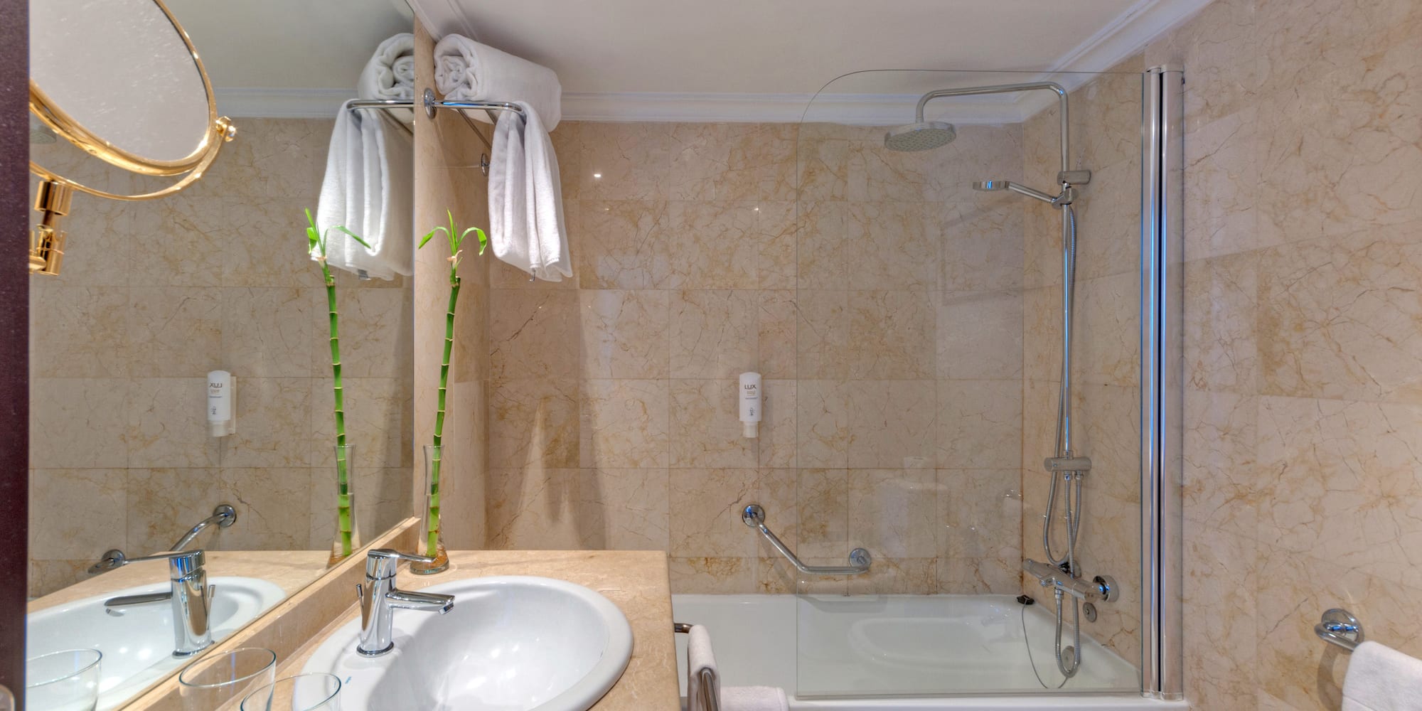 a bathroom with a sink and shower