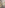 Modern elegant restaurant dining room with set tables, plants, and ornate archway.