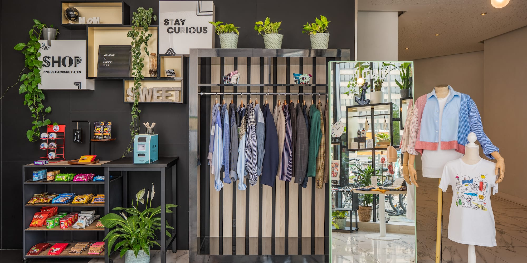 a store with a mannequin and clothes