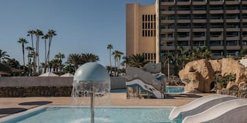 a water slide in a pool