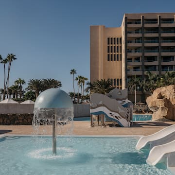 a water slide in a pool