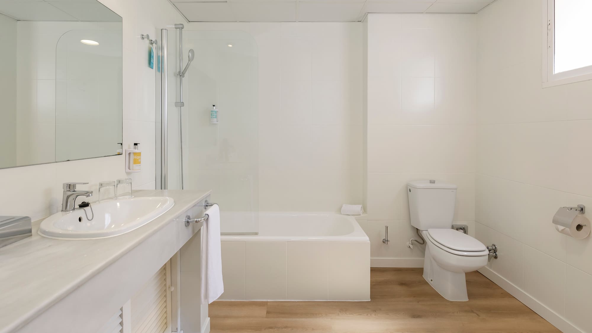 a bathroom with a sink toilet and bathtub