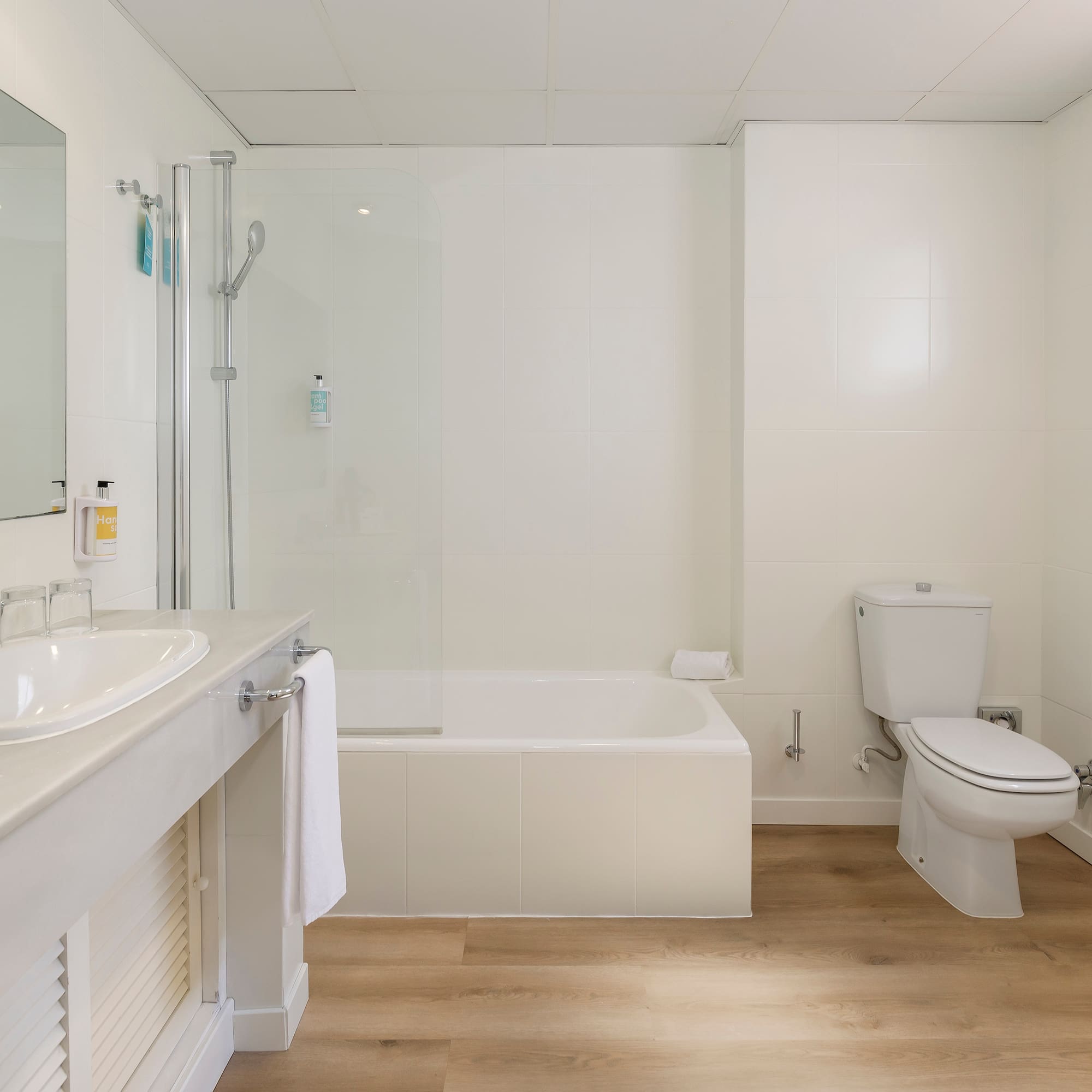 a bathroom with a sink toilet and bathtub