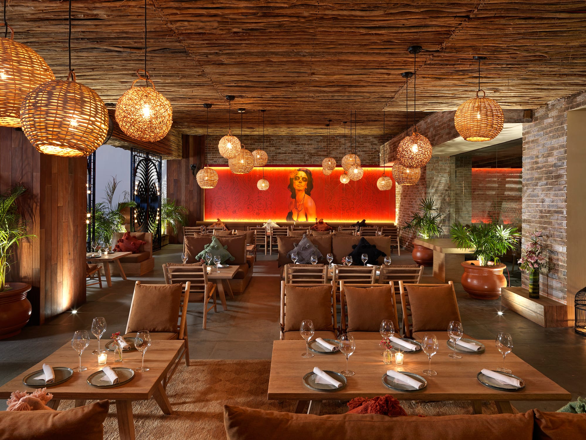 a room with tables and chairs and lamps