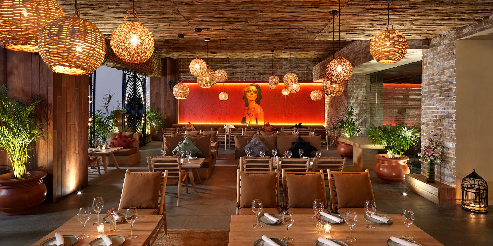 a room with tables and chairs and lamps