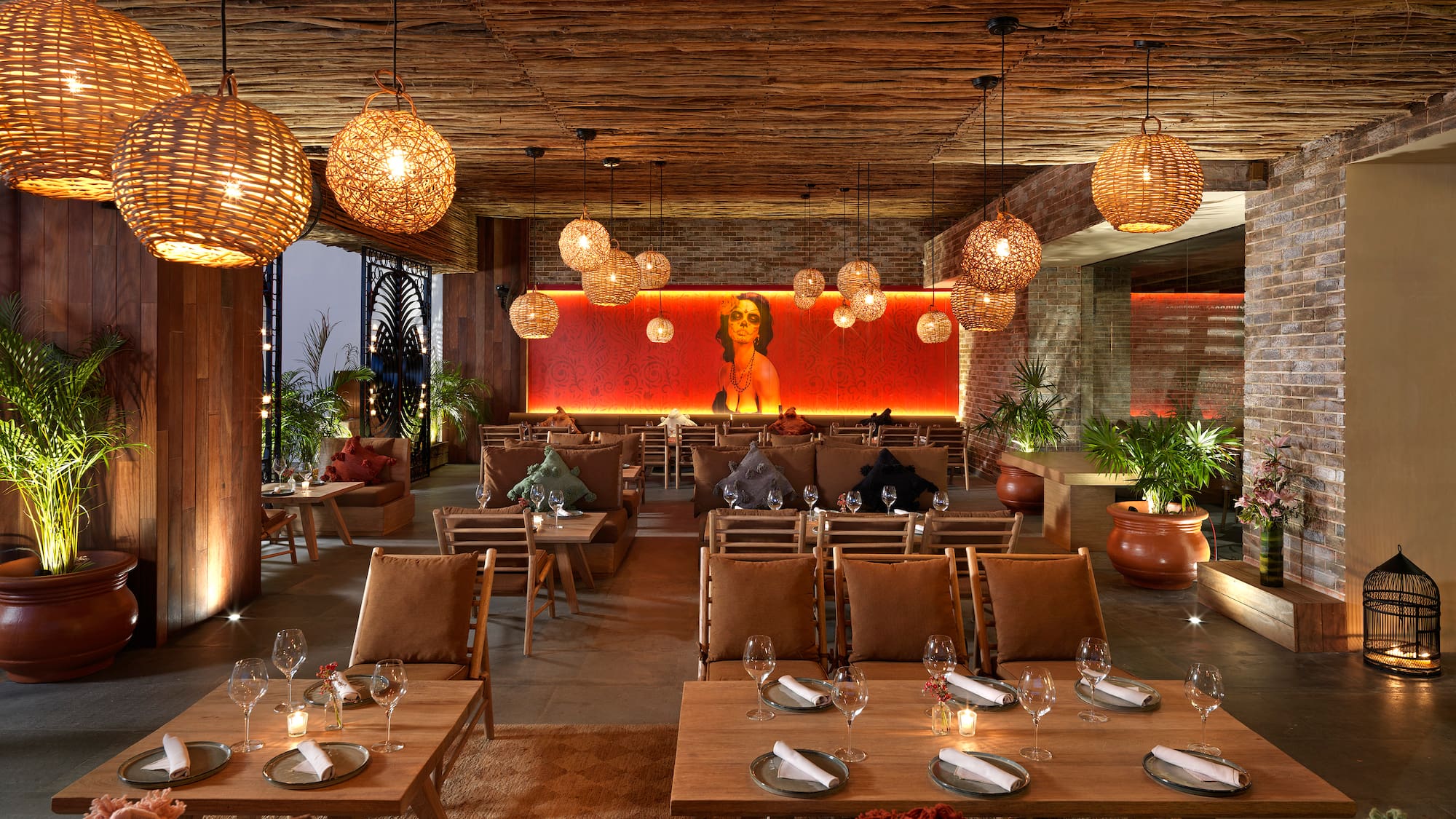 a room with tables and chairs and lamps