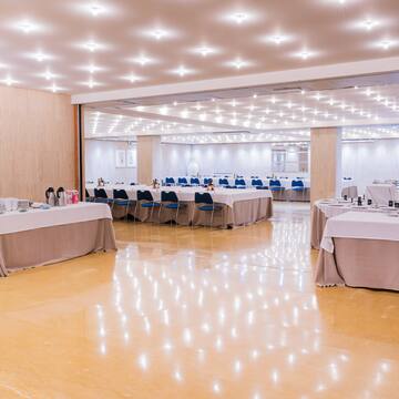 a room with tables and chairs