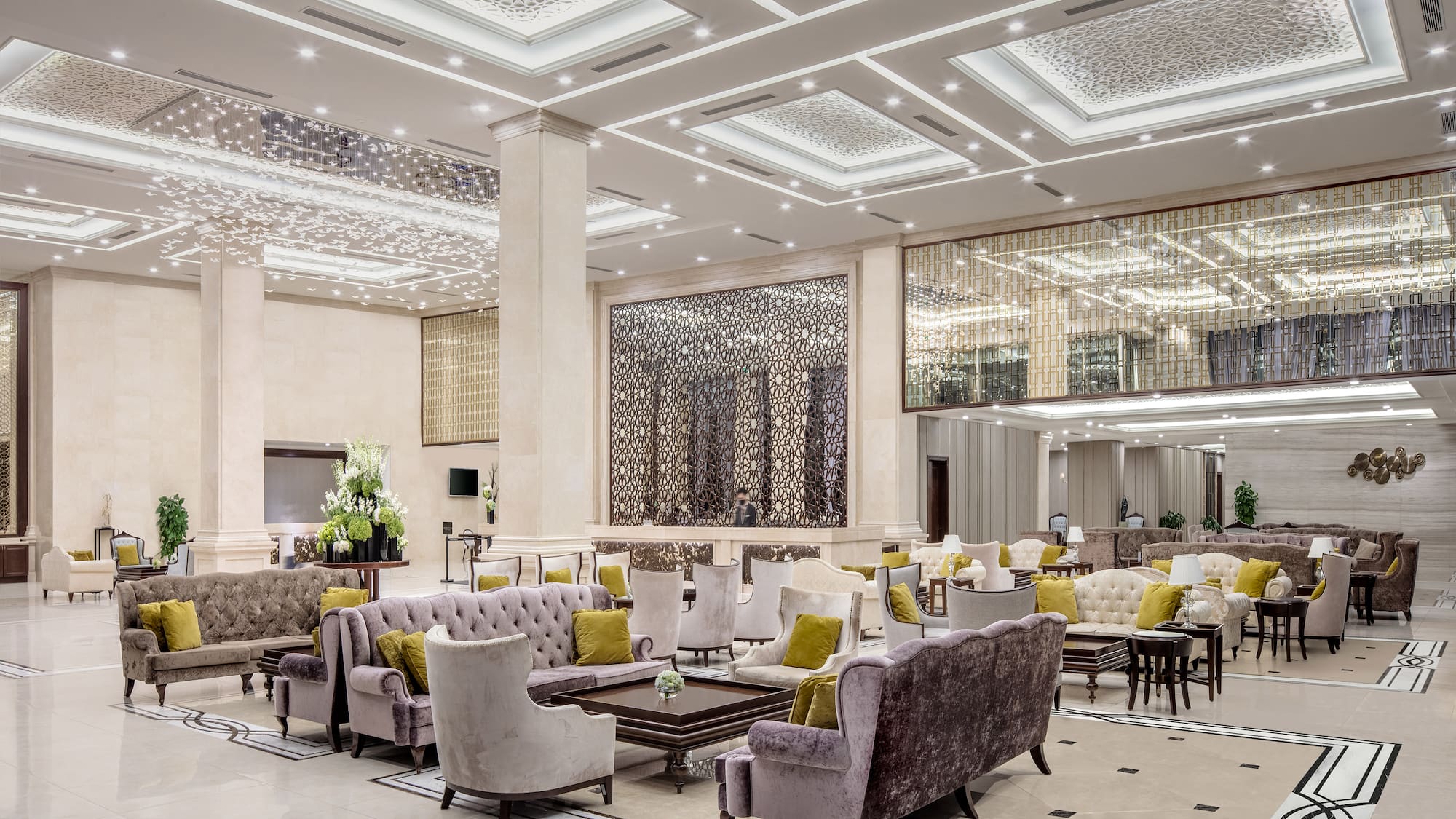 a large room with couches and tables