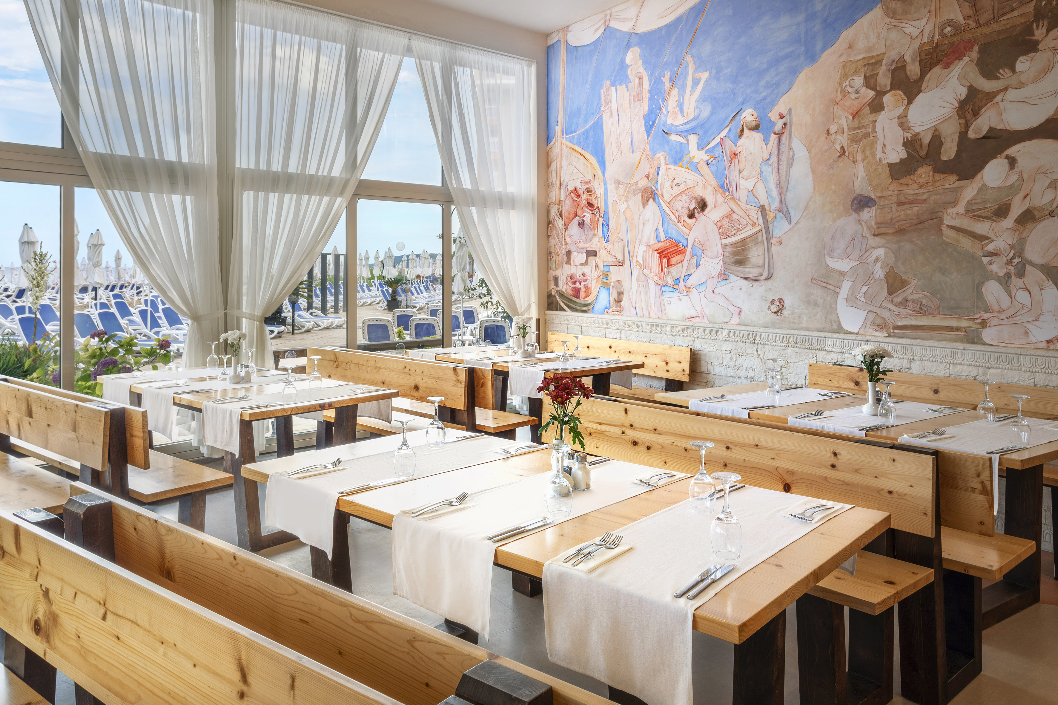 a room with tables and chairs