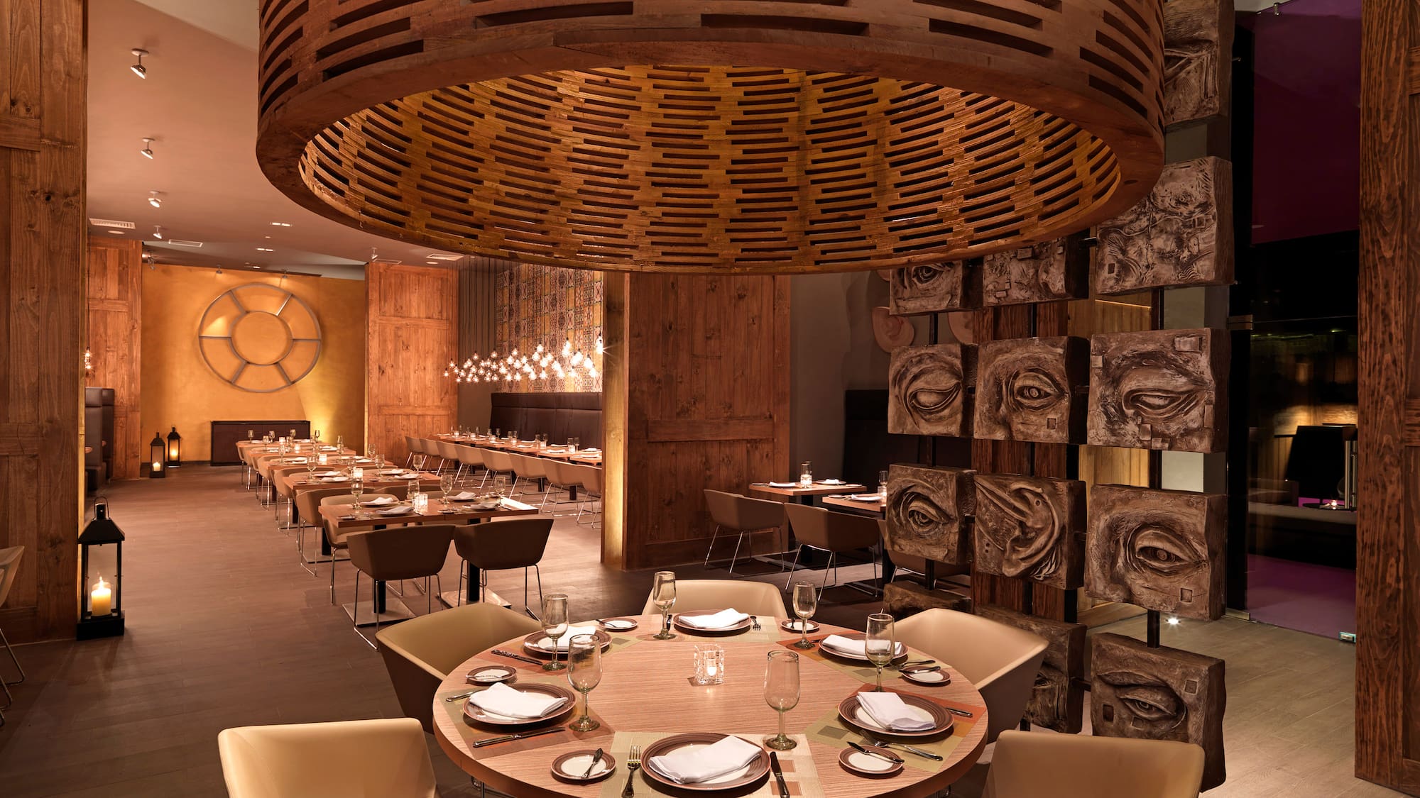 a restaurant with tables and chairs