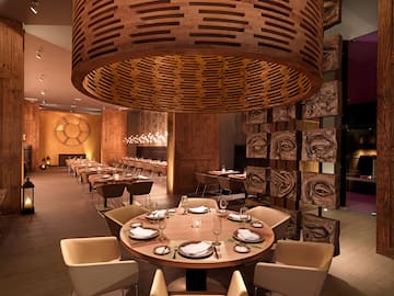 a restaurant with tables and chairs