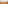 Hot air balloons above golden savanna, scattered trees, distant hills.