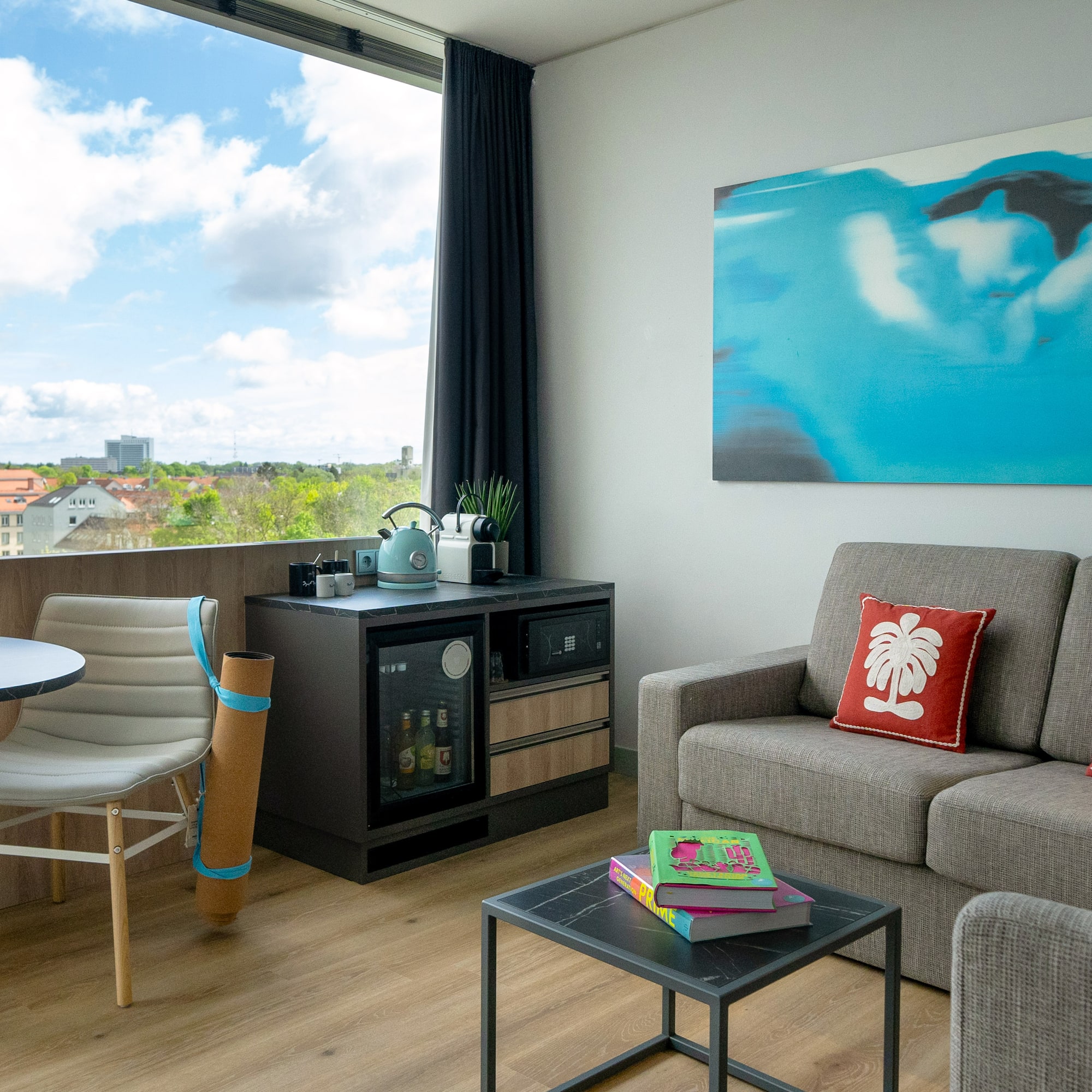 a living room with a table and couch