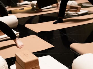 a group of people doing yoga