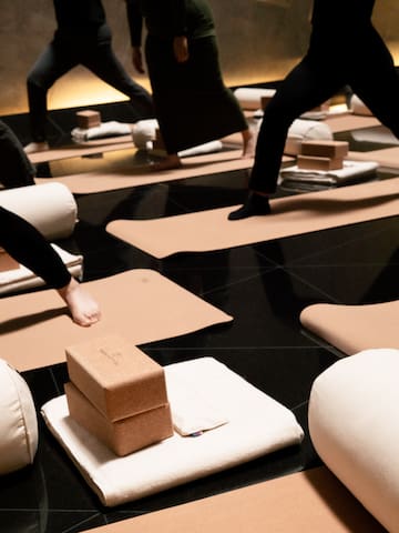 a group of people doing yoga