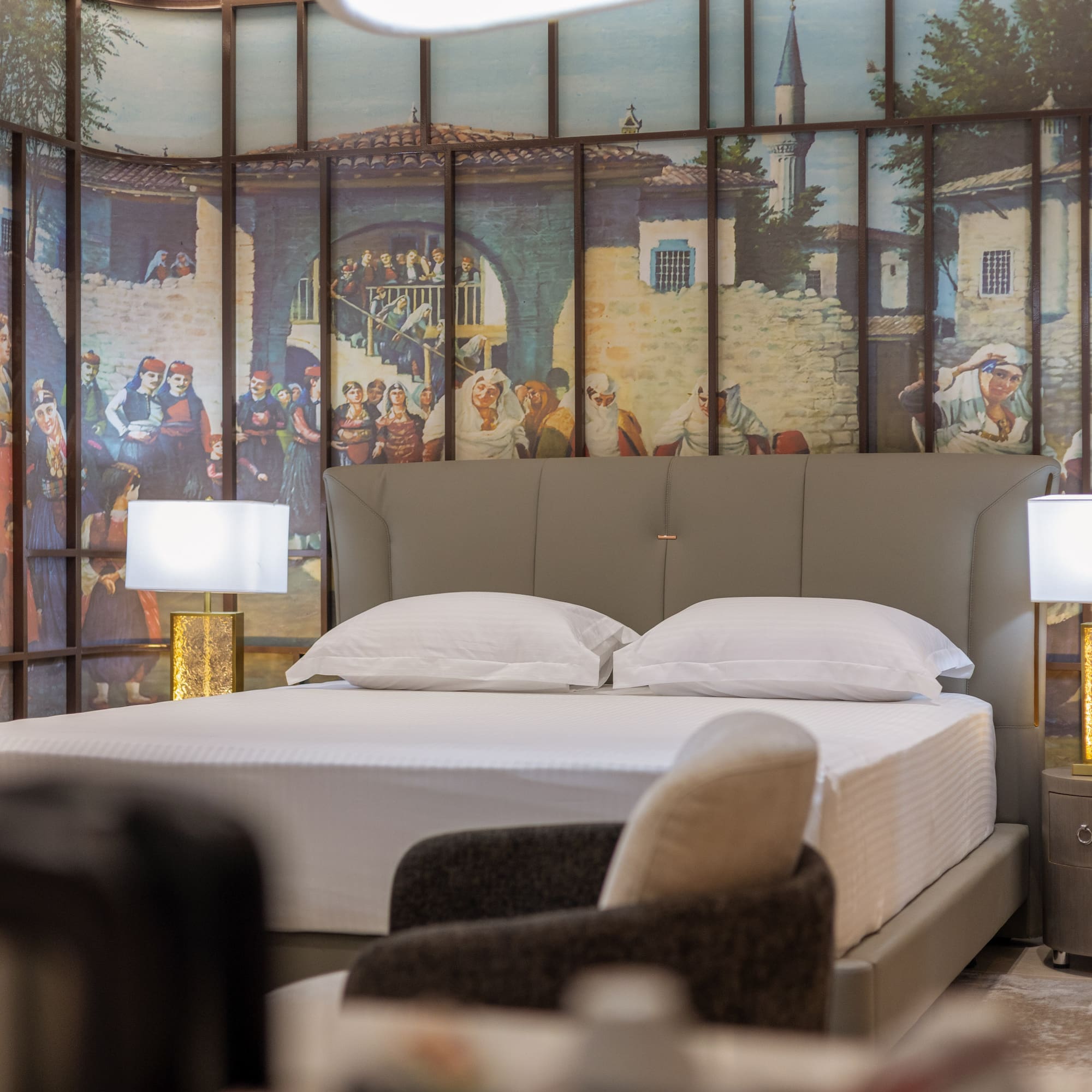 a bed with a wallpaper on the wall