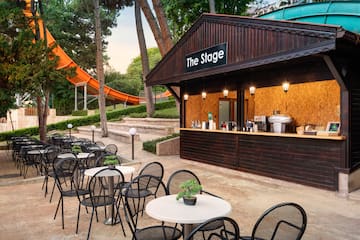a small outdoor bar with tables and chairs