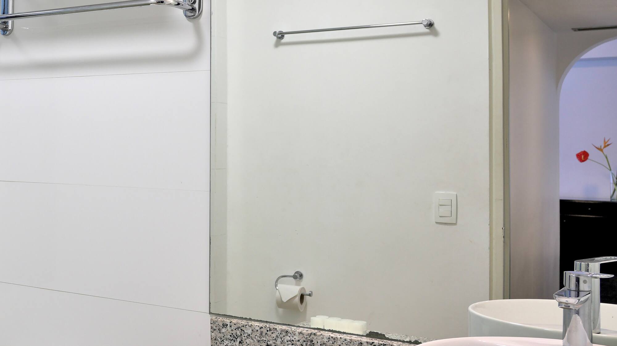 a bathroom with a sink and toilet