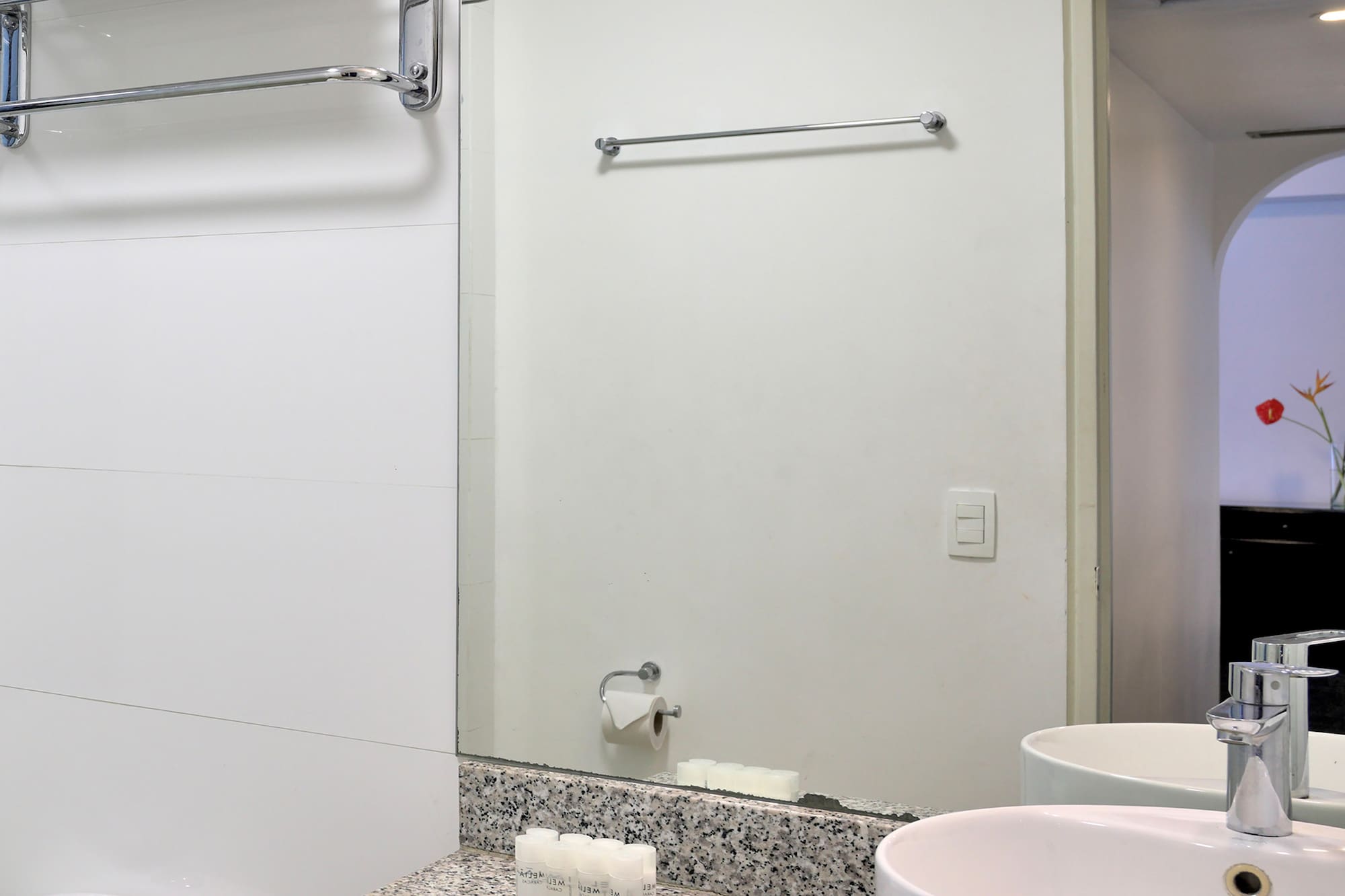 a bathroom with a sink and toilet