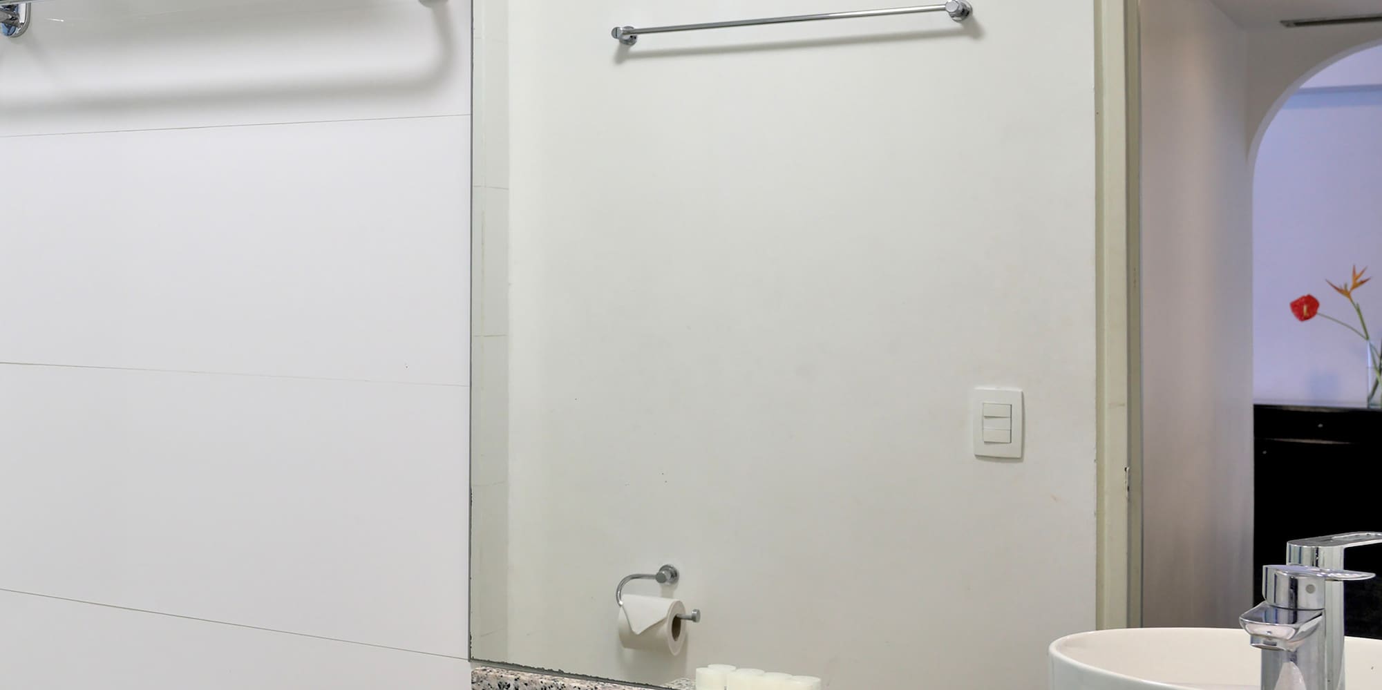 a bathroom with a sink and toilet