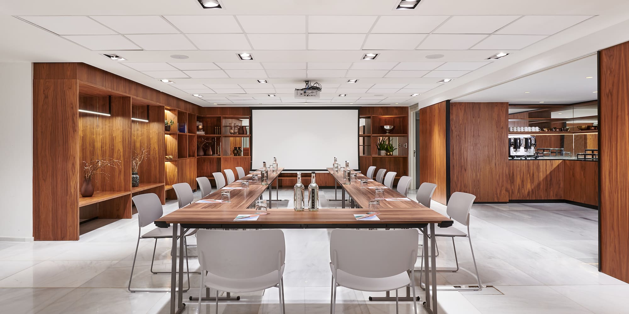 a room with a table and chairs