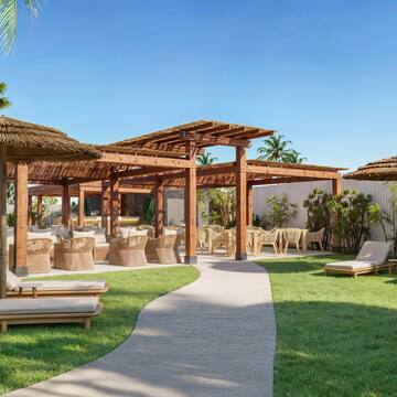 a patio area with chairs and umbrellas