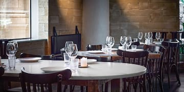 a room with tables and chairs