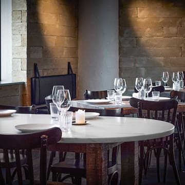 a room with tables and chairs