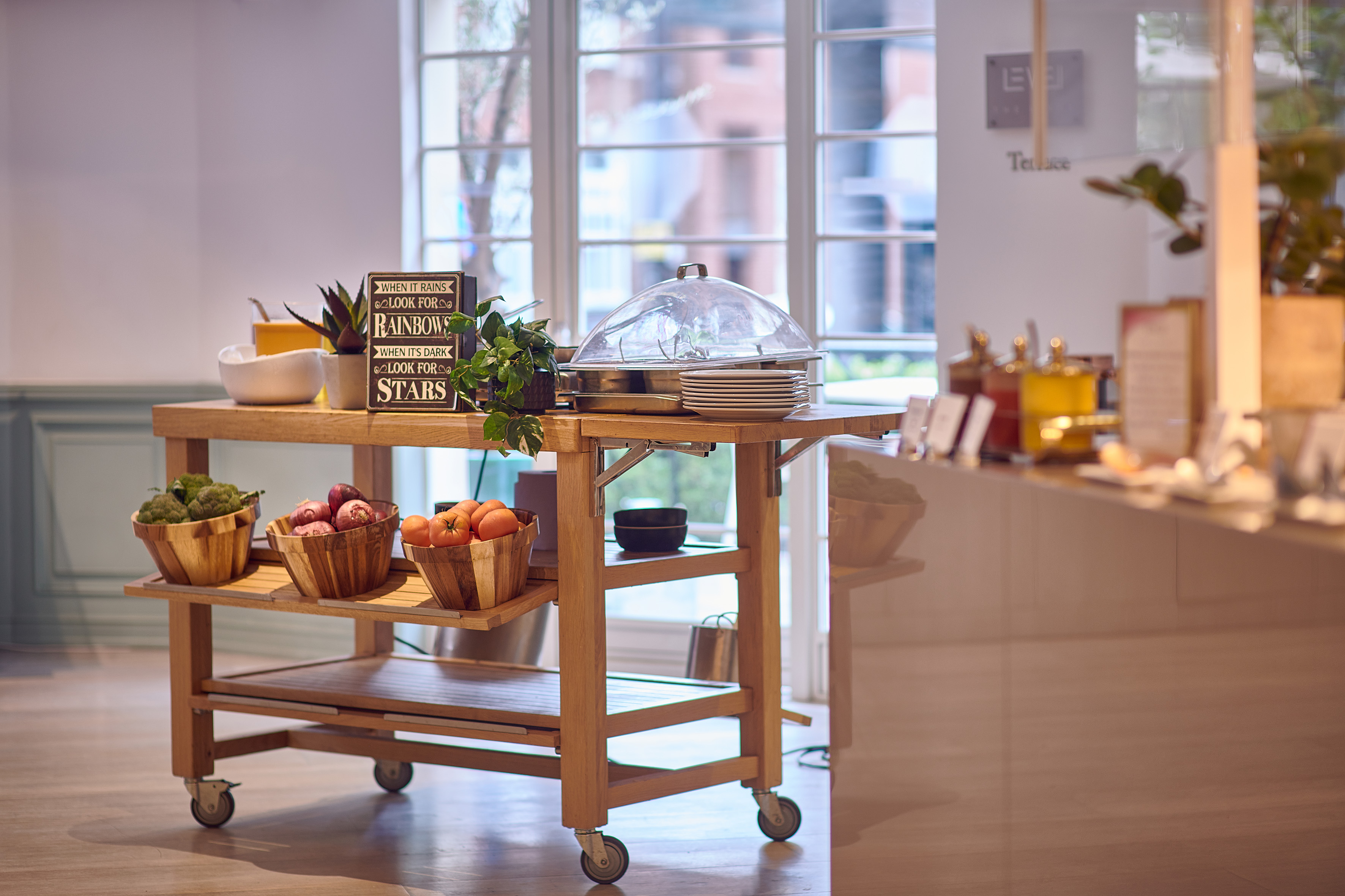a kitchen cart with food on it